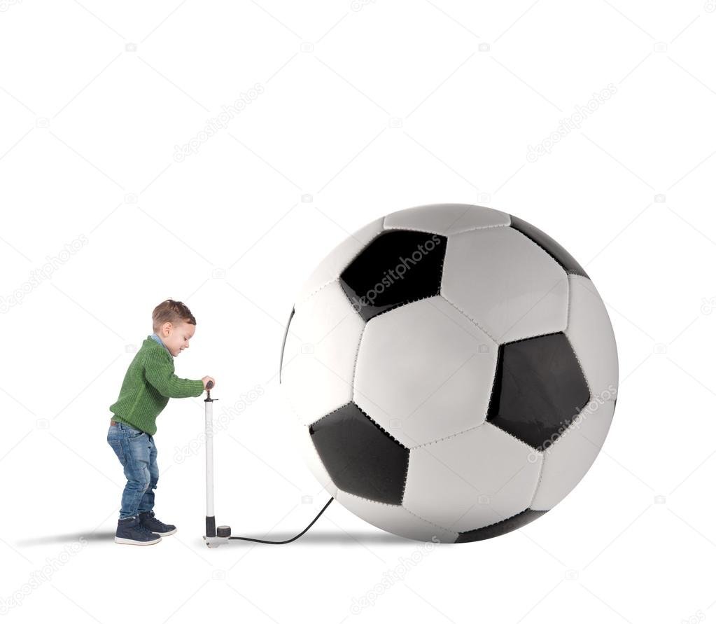 depositphotos_110288040-stock-photo-boy-pumping-up-big-ball.jpg