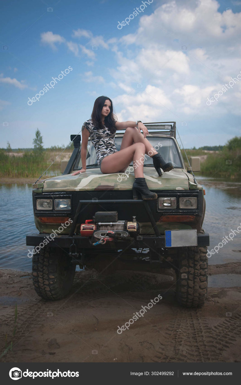 depositphotos_302499292-stock-photo-sexy-girl-all-road-car.jpg
