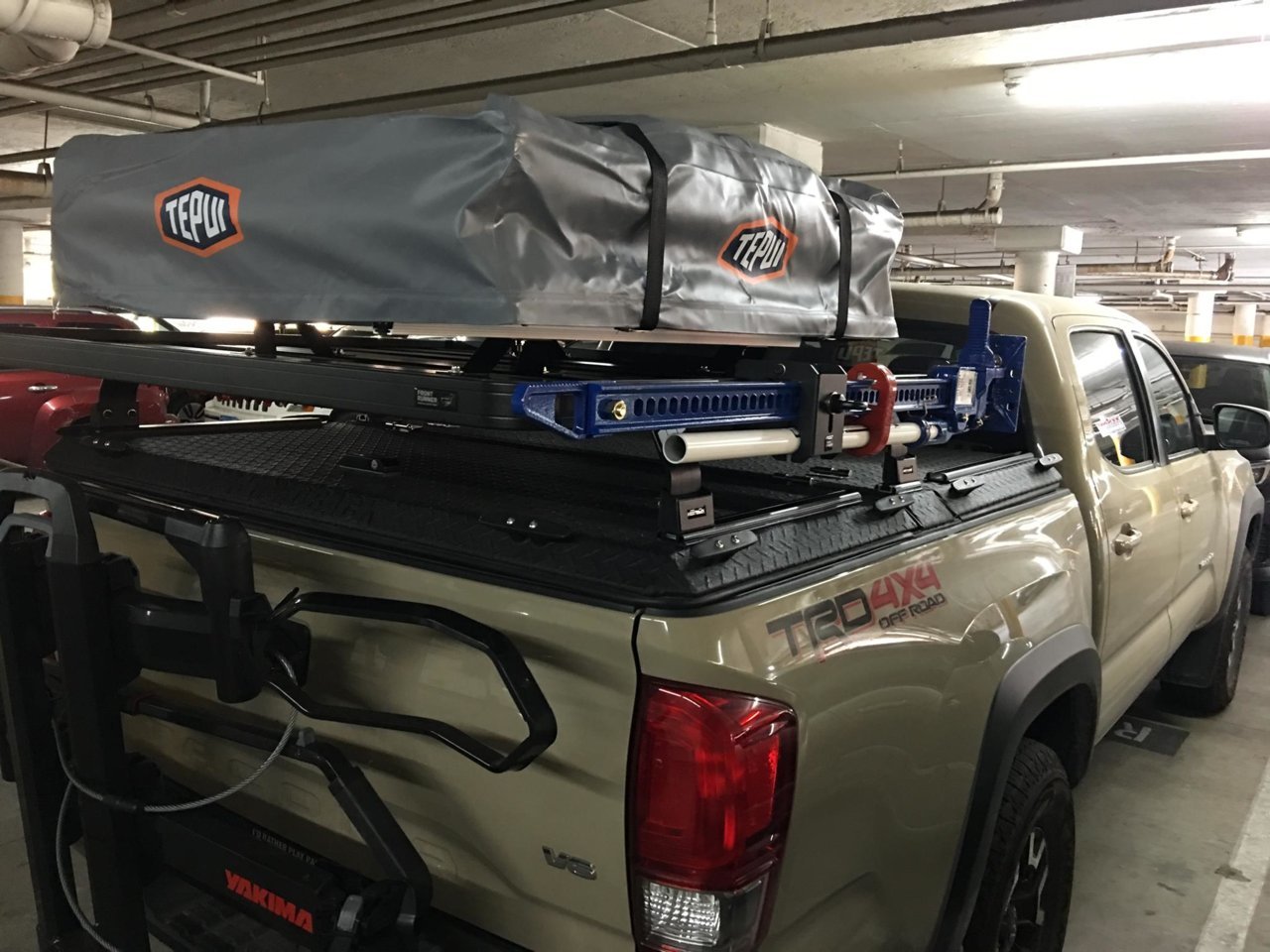 DiamondBack HD Cover opens with bed rack on top - Patriot Hi Lift Jack.jpg