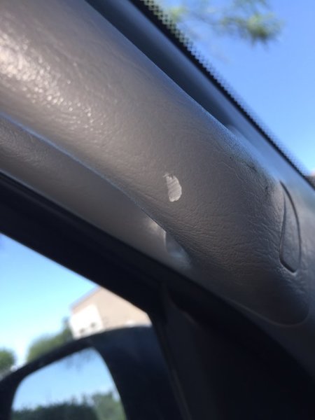 Driver Handle Dent.jpg