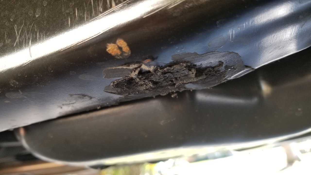 Driver side frame rust.jpg
