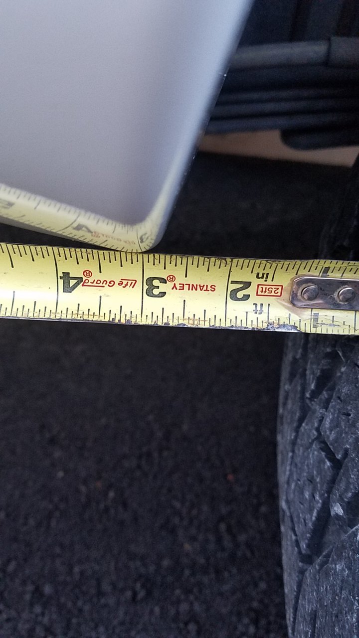 Driver tire to rear wheel well.jpg