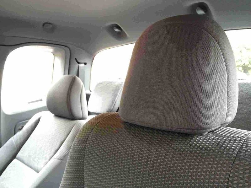 Driver's headrest reversed and passenger seat reclined back.jpg