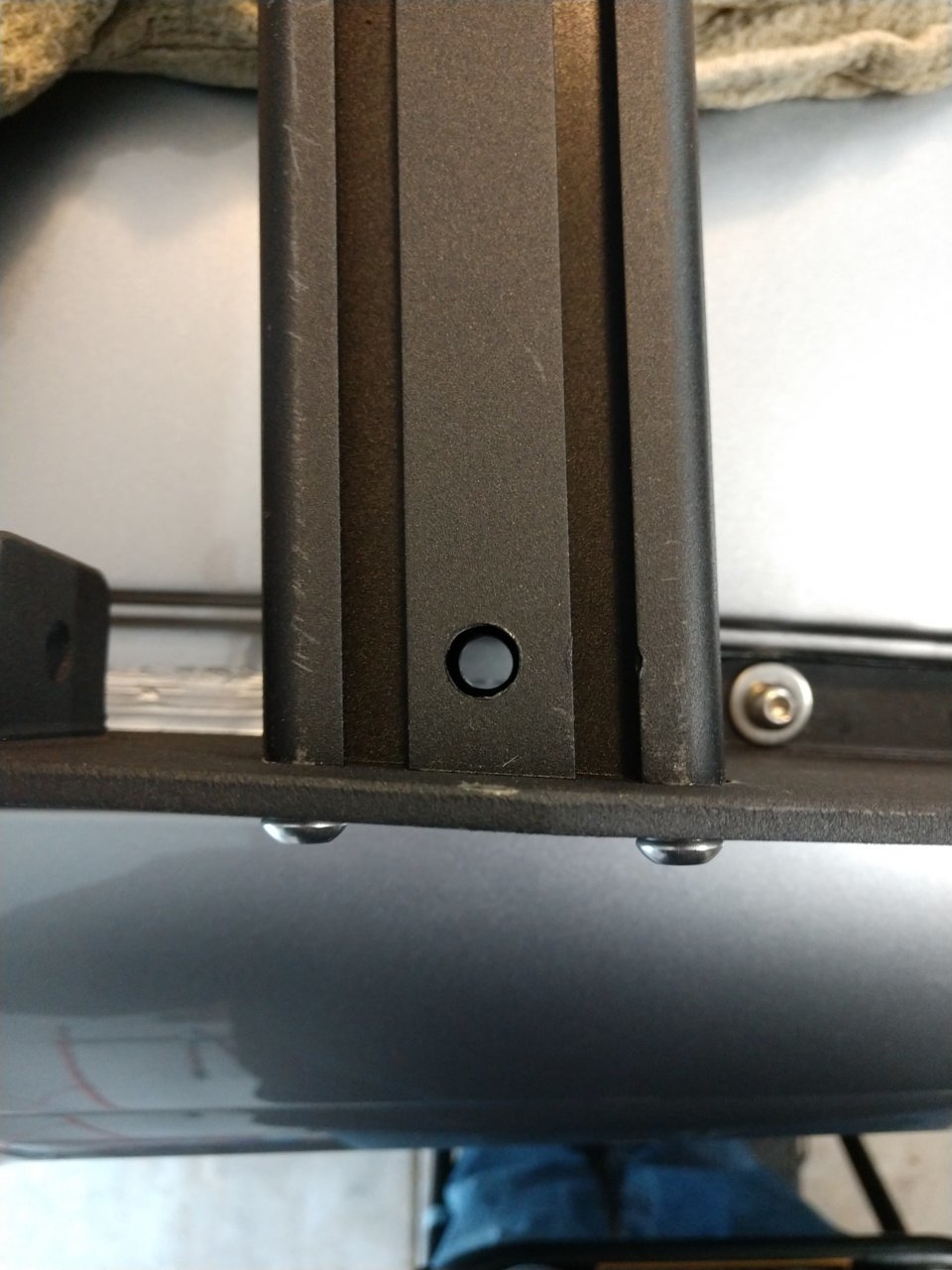 DV8 roof rack drain hole.jpg