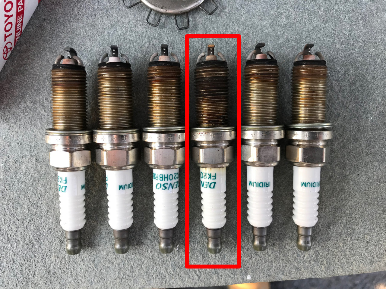 Loose Spark Plug From The Factory World