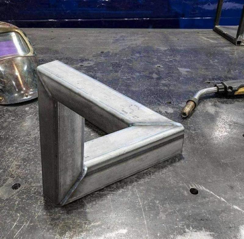 Escher Welding.jpg