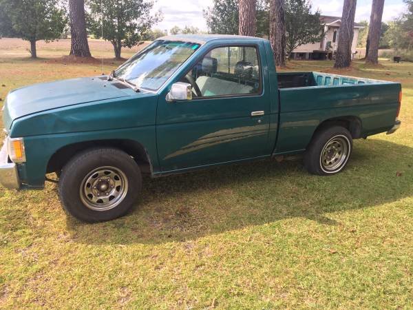 f1995_Nissan_Hardbody_Truck__1700_Lake_Ci_59f75ab34d763.jpg