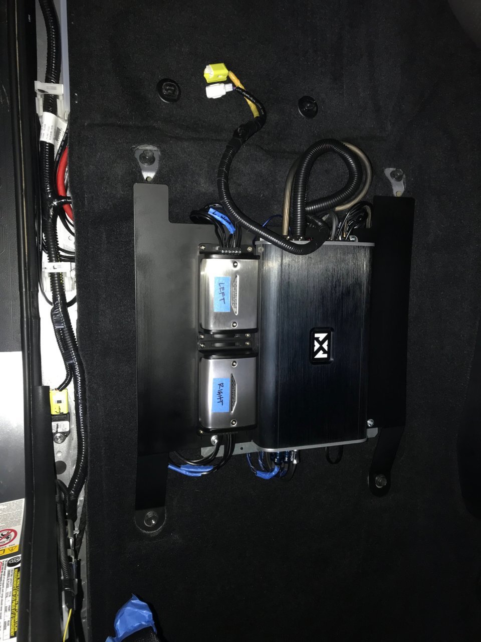 Under rear seat amp mounting. World