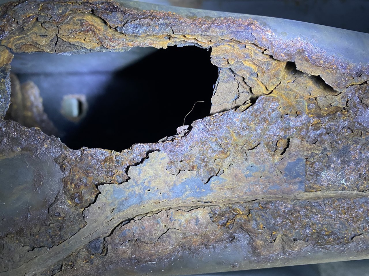 FRAME HOLE Driver Side.jpg