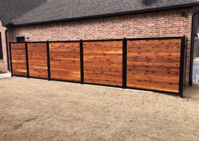 gallery2-metal-frame-fence_0001_horizontal-stained-cedar-400x284.jpg