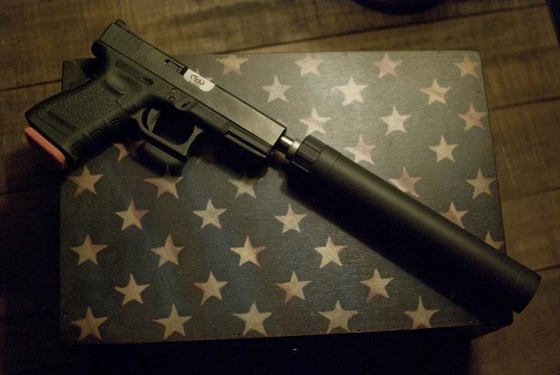 Glock_zpsa7351bfd_d3426a21d445cbd370cef3e0d41bbc547631cfa2.jpg