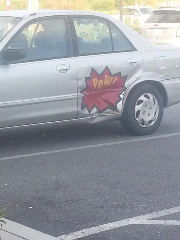 guy-fixes-dent-in-his-car-169794.jpg