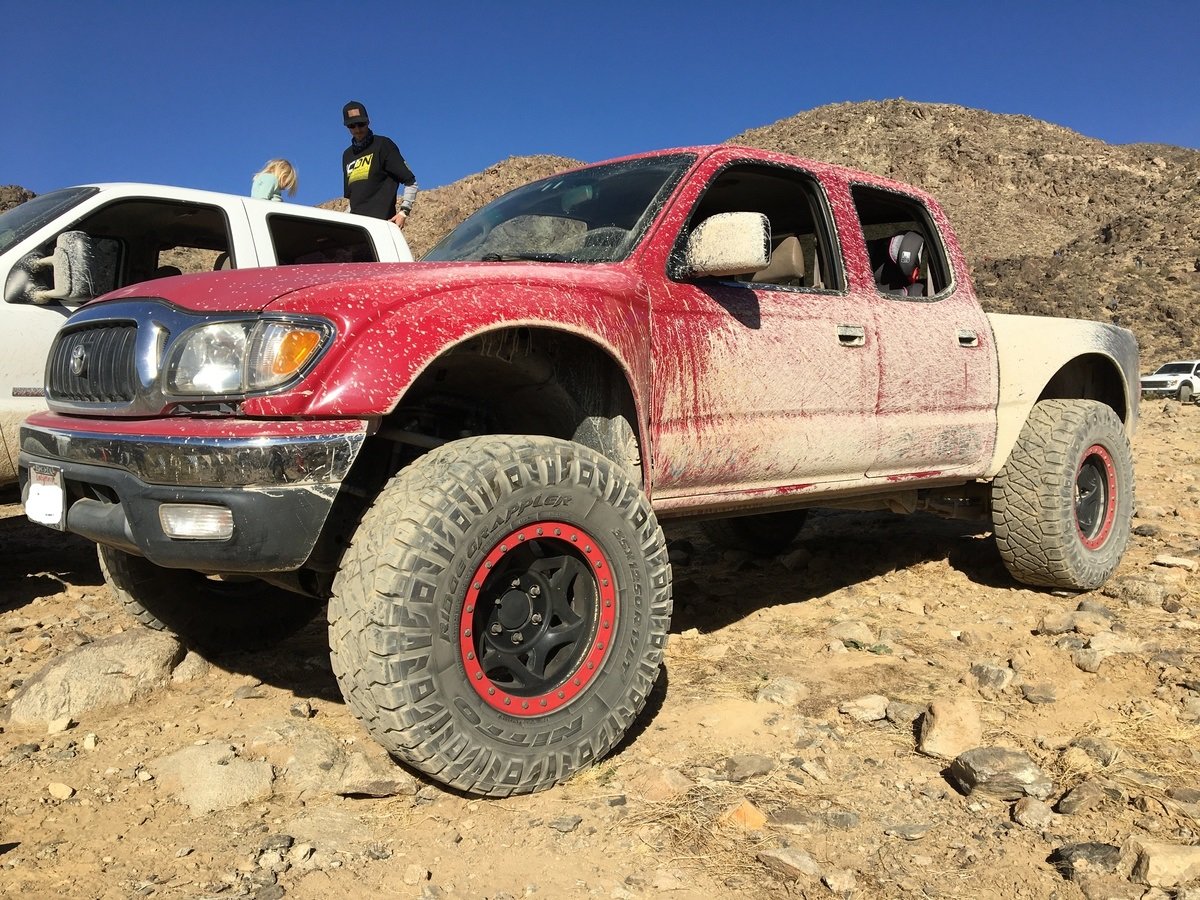 tacoma long travel stock fenders