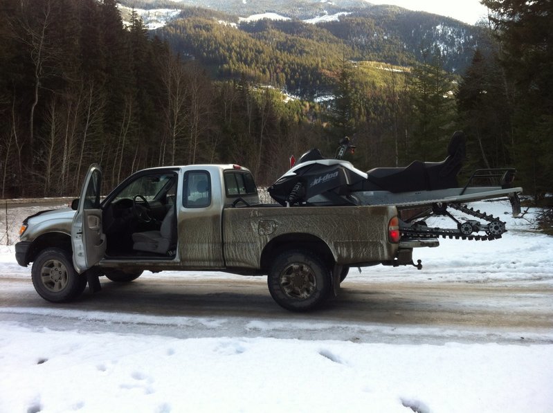 Snowmobile on back of tacoma? Anyone using the cantilever type deck ...