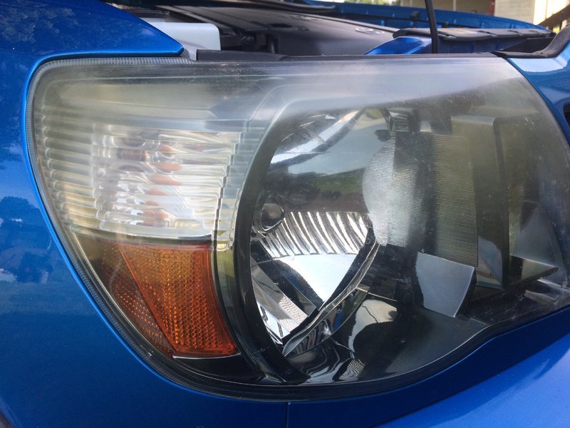 Headlight restoration with Opti-lens coating