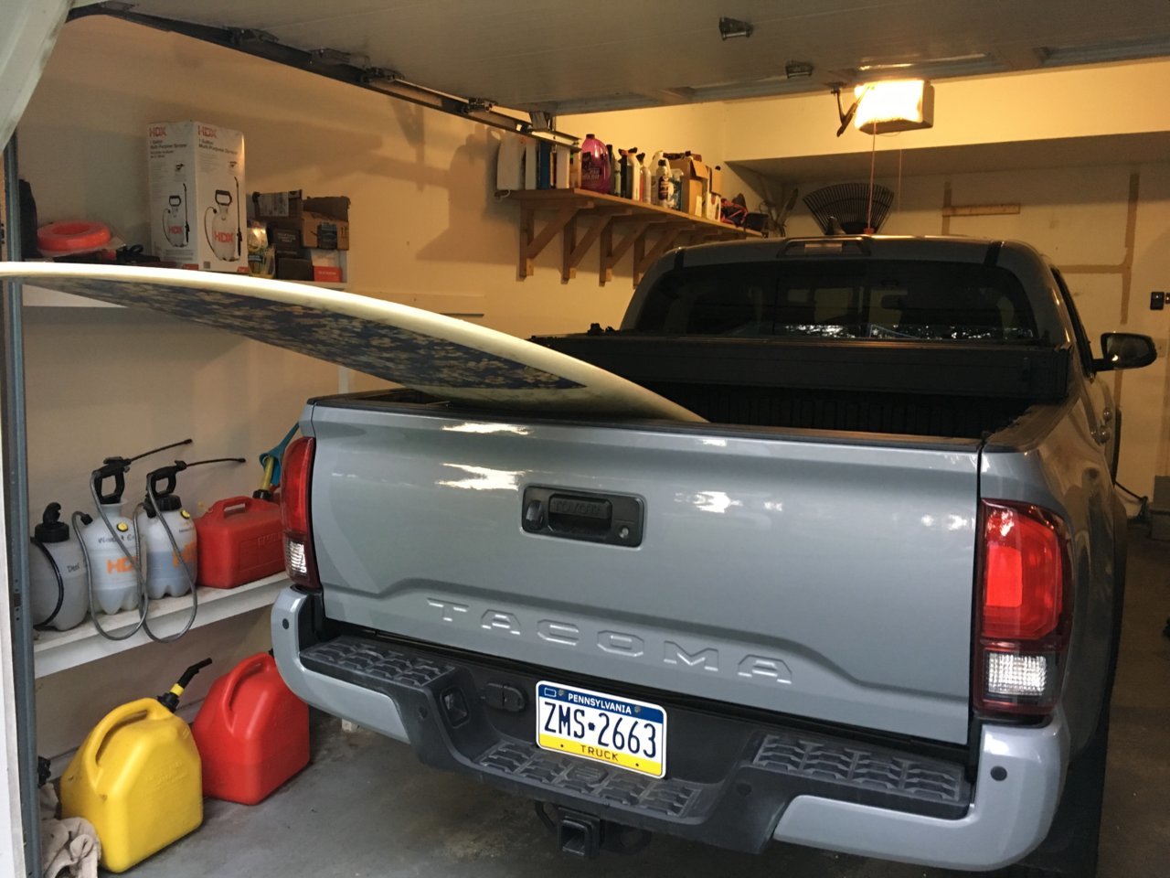 Securing paddle board discount in truck bed