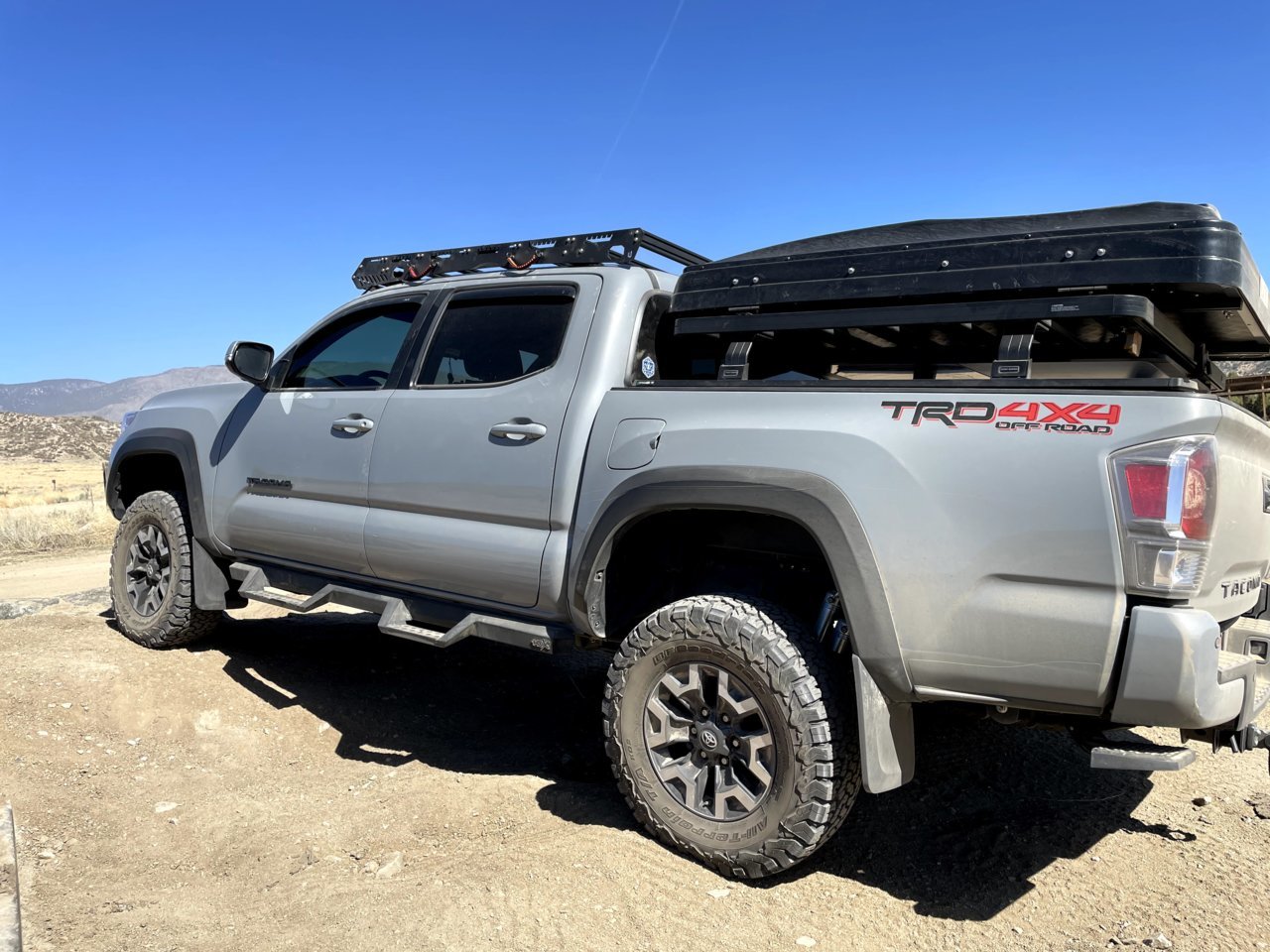 elevated bed rack and tonneau cover combo that let's me open the cover ...