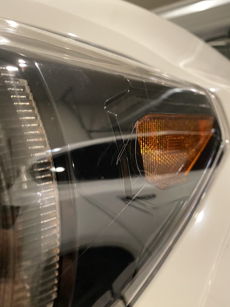 Headlight scratch (touch up/repair inquiry)