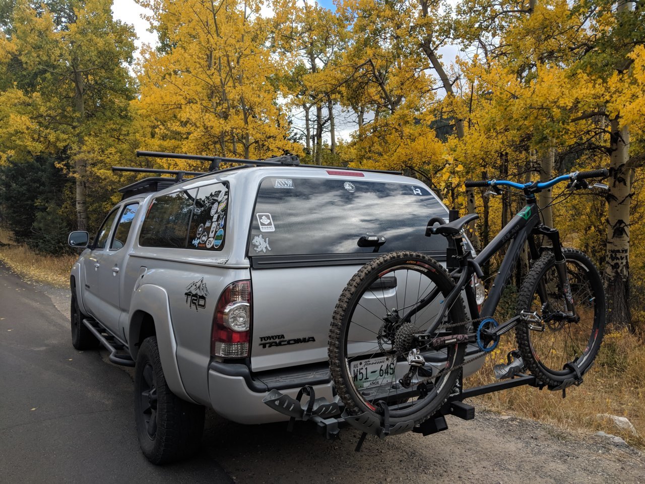 Bikes in truck bed with topper new arrivals