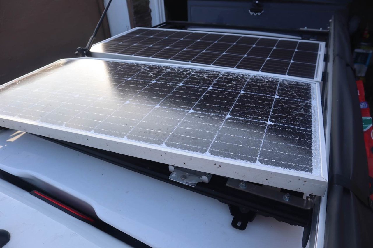 Mounting solar panel discount to rhino rack