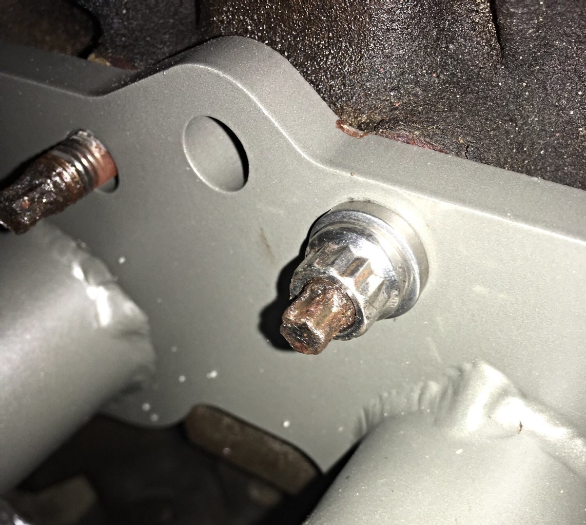 How to remove the exhaust manifold studs? World