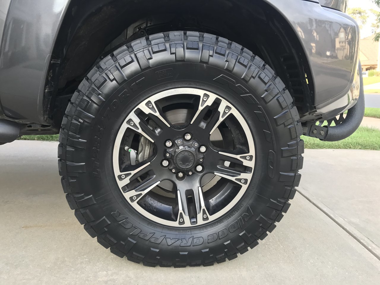 285/70 r17 nitto ridge grapplers with a 1.75" bilstein lift in front a...
