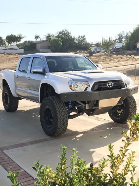 long travel vs mid travel tacoma