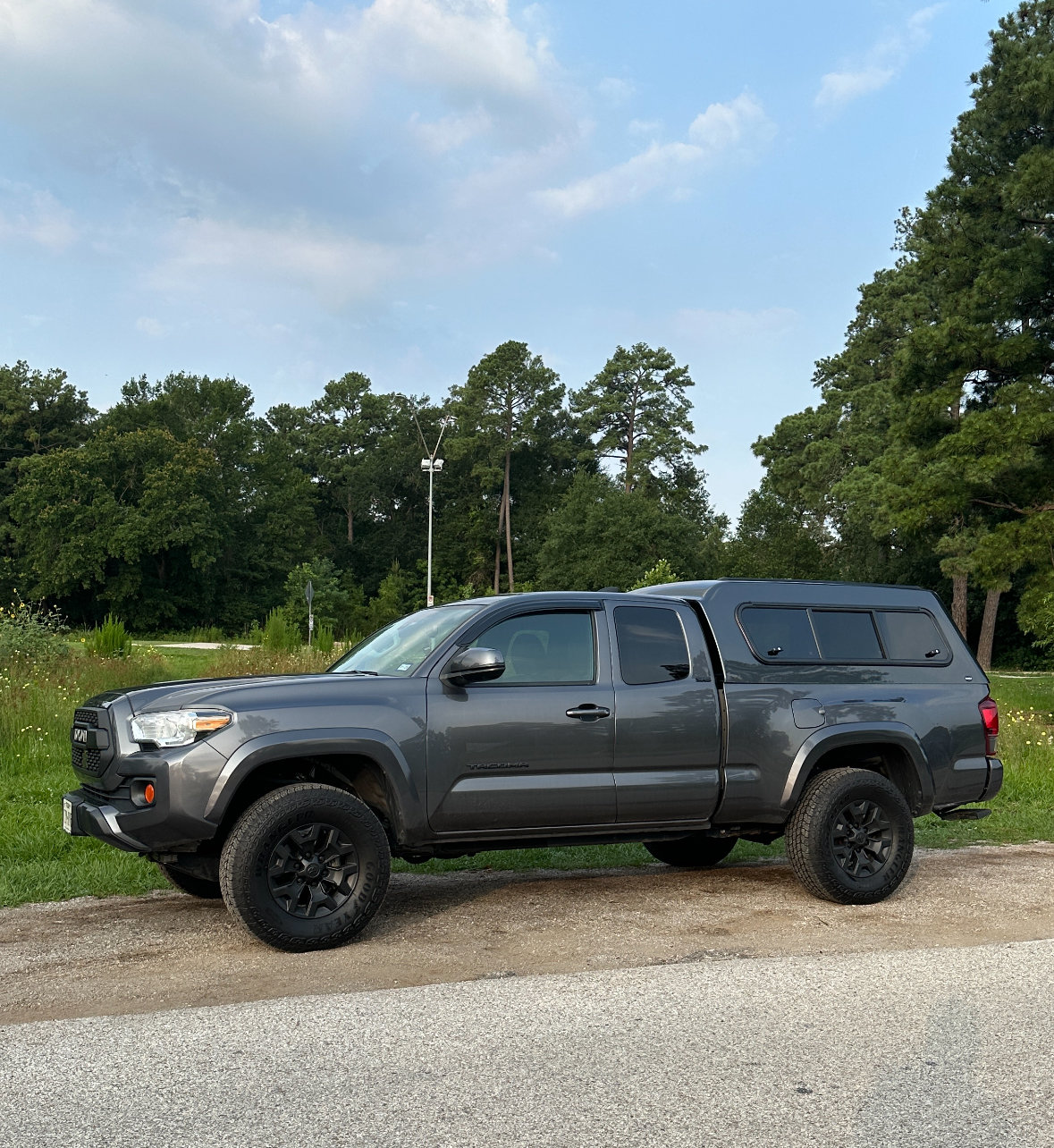 3rd gen Tacoma long bed Ranch Skyline Mid-rise truck camper topper with ...