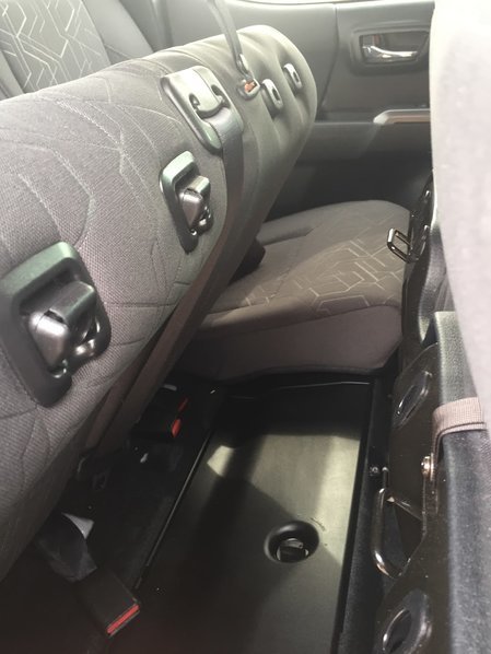 Anyone know how to release the rear middle seat belt? : r/Camry