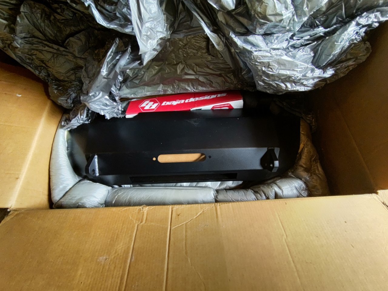 Inside showing winch cutout and Baja Designs light bar.jpg