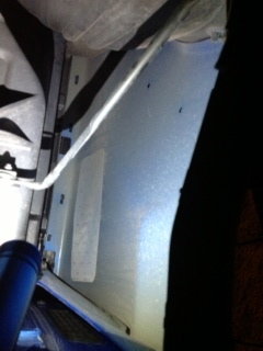 inside the RR fender in front of the tire.jpg