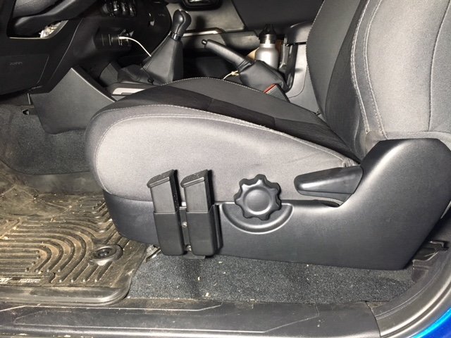 Install-pistol-magazine-pouch-on-3gen-tacoma-driver-seat-07.jpg