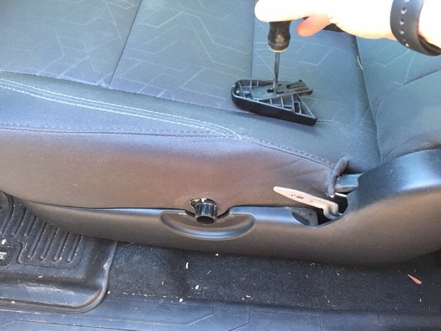 Install-pistol-magazine-pouch-on-3gen-tacoma-driver-seat-11.jpg