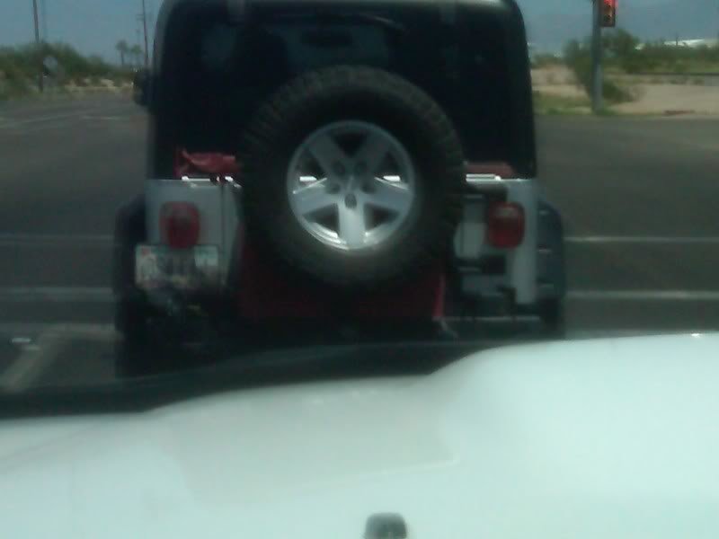 jeeptirecarrier1_192e272f913cc042de652254b920f3e60cea1bef.jpg