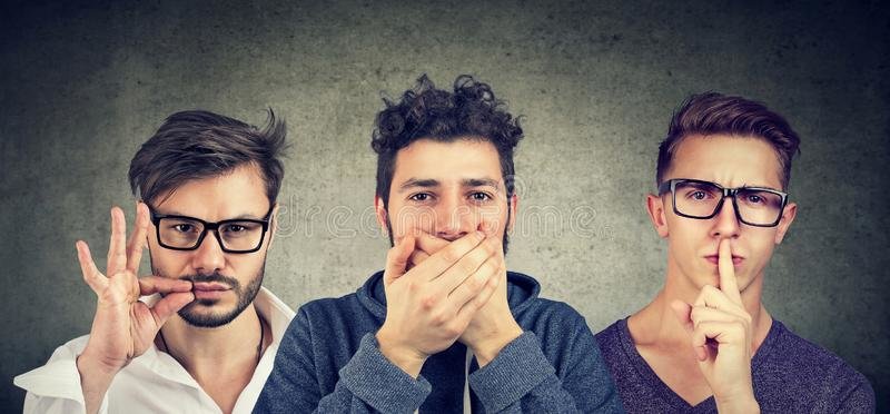 keep-secret-be-quiet-concept-three-secretive-men-keeping-mouth-shut-127250761.jpg