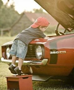 kid-working-on-69-Camaro-SS.jpg