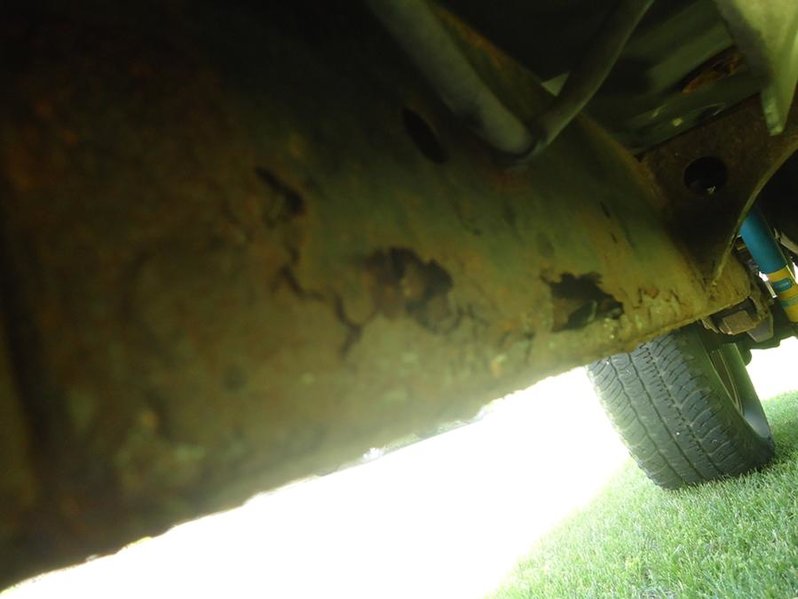 left passenger rust.jpg