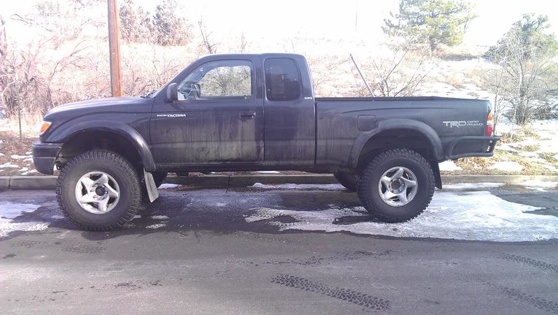Lift with new tires.jpg