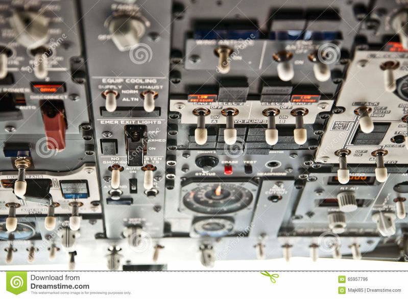 lots-switches-modern-jet-airliner-cockpit-overhead-panel-65957796.jpg