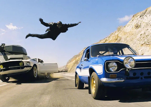 man-jumps-from-car.jpg