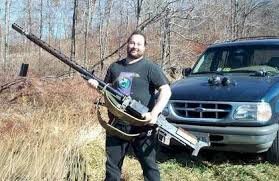 ManWithBigGun_163fd1327465fea9391c483dfba75994b517b96b.jpg