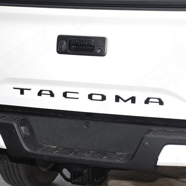 matte-black-tacoma-tailgate-insert-on-truck-nox-lux.jpg