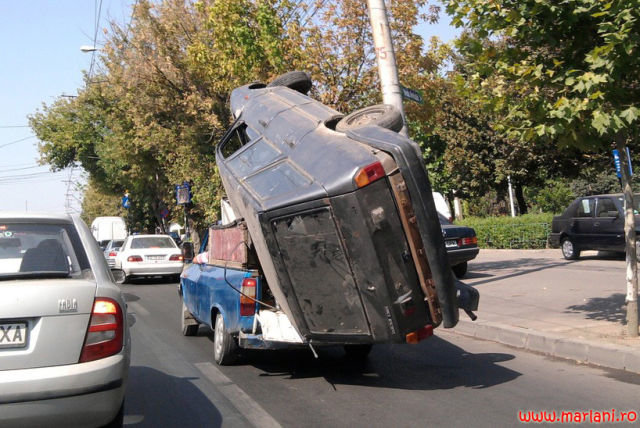 misc-truck-hauling-another-truck-in-the-bed-of-the-first-truck.jpg