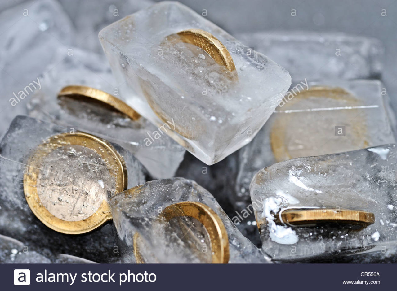 one-euro-coins-in-ice-cubes-symbolic-image-for-frozen-funds-CR556A.jpg