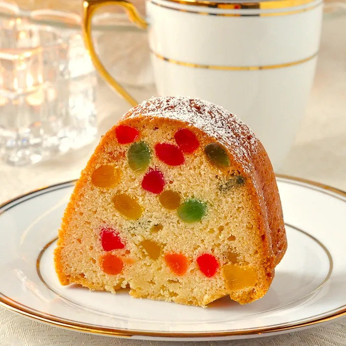 One-slice-of-gundrop-cake-on-a-white-and-gold-plate.jpg.jpg