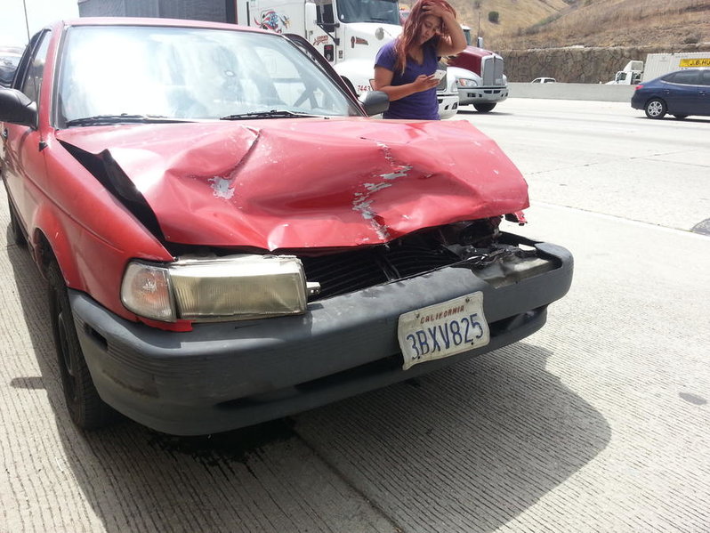 other car damage from accident.jpg