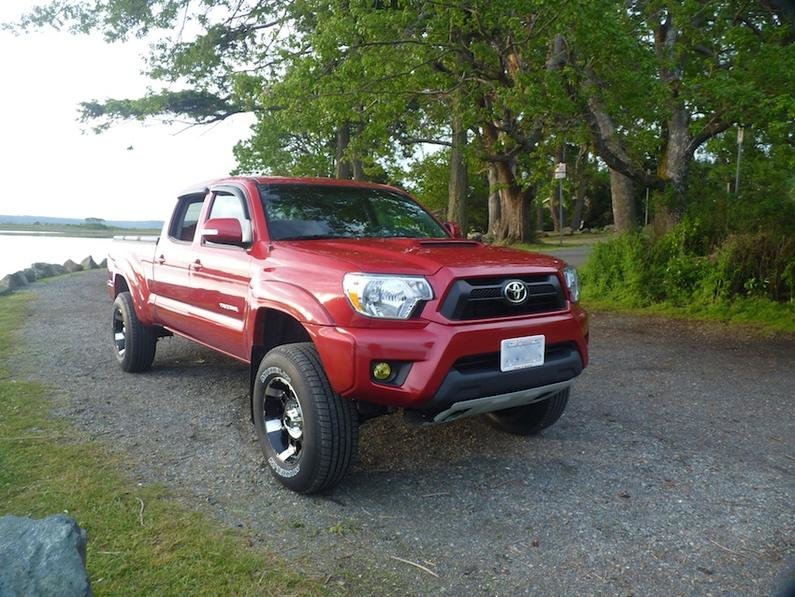 P1020980a tacoma barcelona red 2012 xd spy michelin m:s 2 lifted.jpg