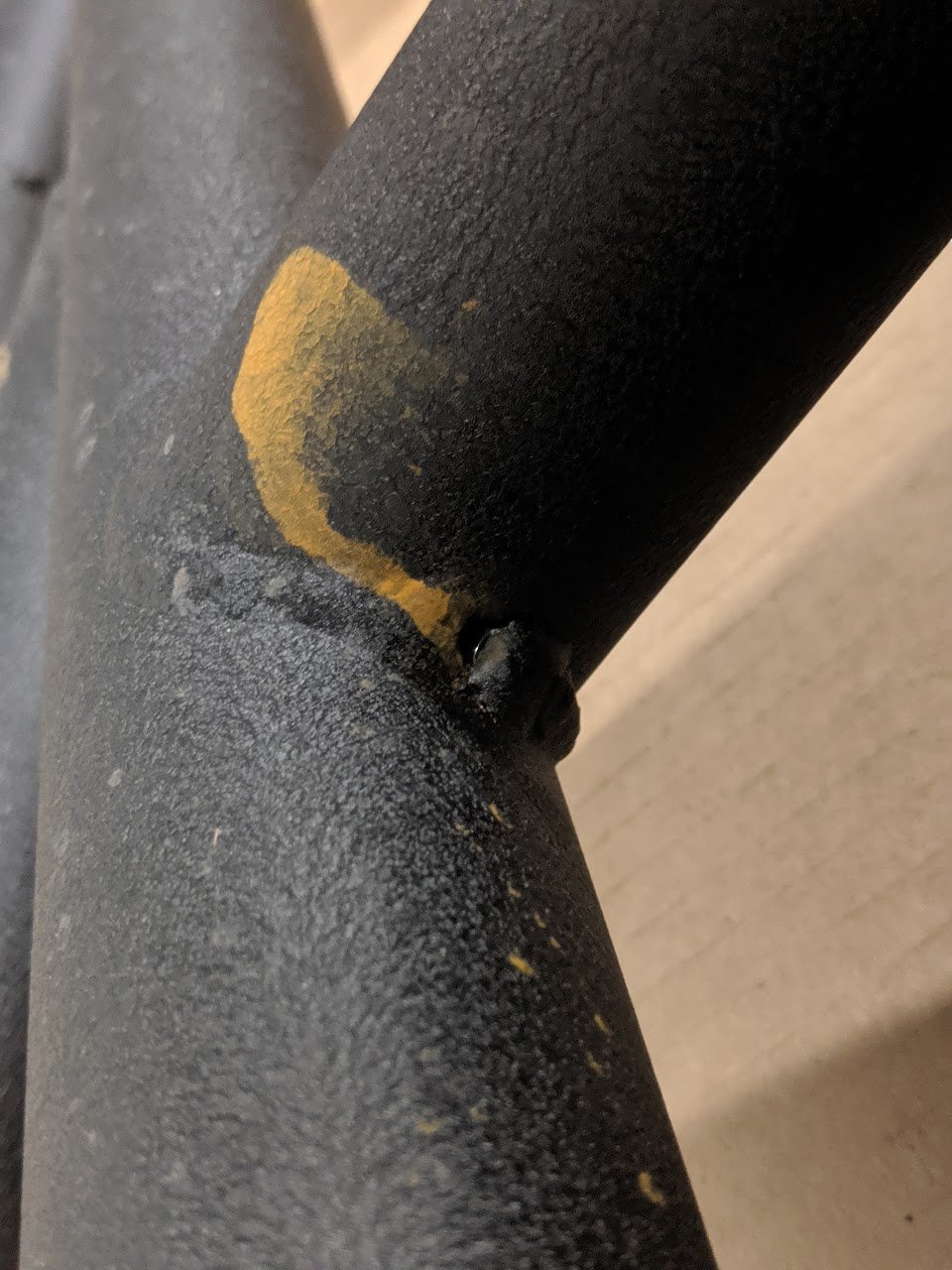 passanger side rust hole.jpg