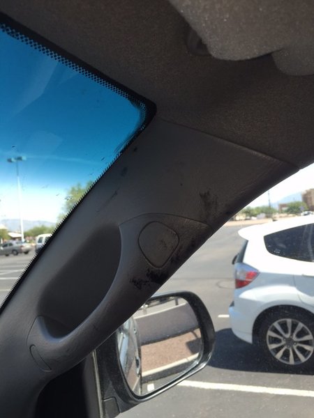 Passenger Handle and windshield gunk.jpg