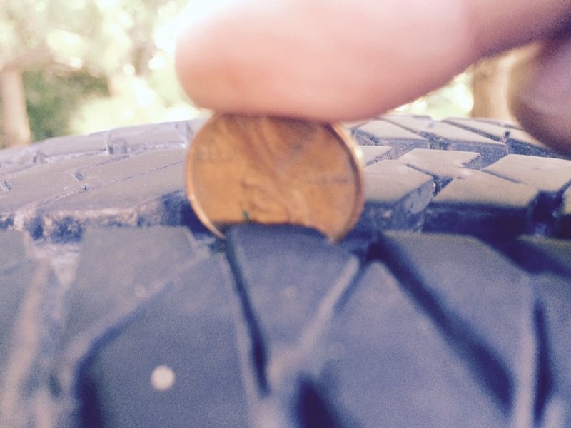 penny in tacoma tire.jpg